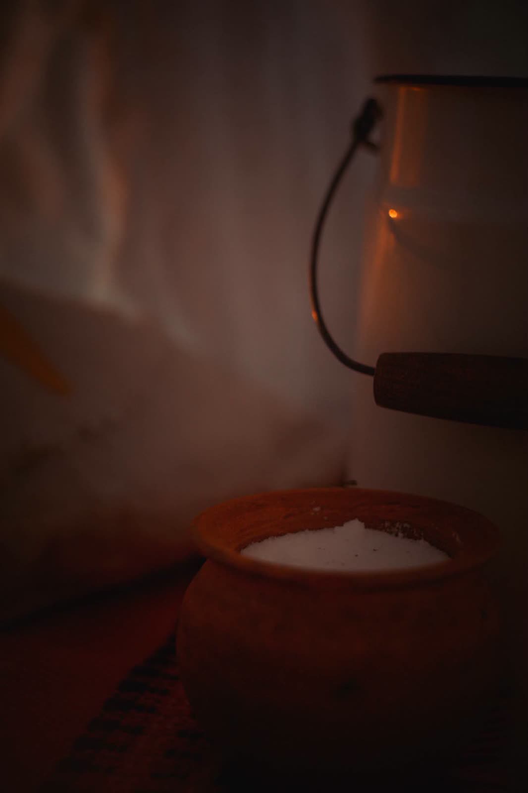 Milk churn and a small pot of salt