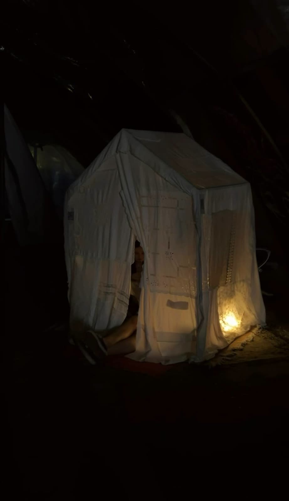 The textile house glowing in the dark